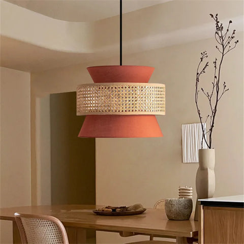 Aka light terracotta tiered pendant light with a woven rattan band perfect for cozy home lighting