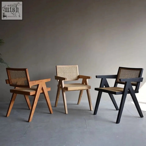 Three akane chairs with sleek silhouette wooden frames and woven rattan backrest in natural and black tones