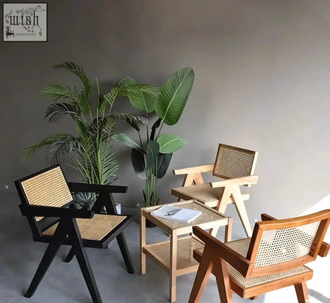 Three akane chairs with woven rattan backrest feature sleek silhouette in black and natural wood tones