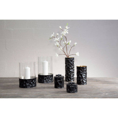 Akola black and gold large hurricane candle holder with black textured base and clear glass cylinder for white candles