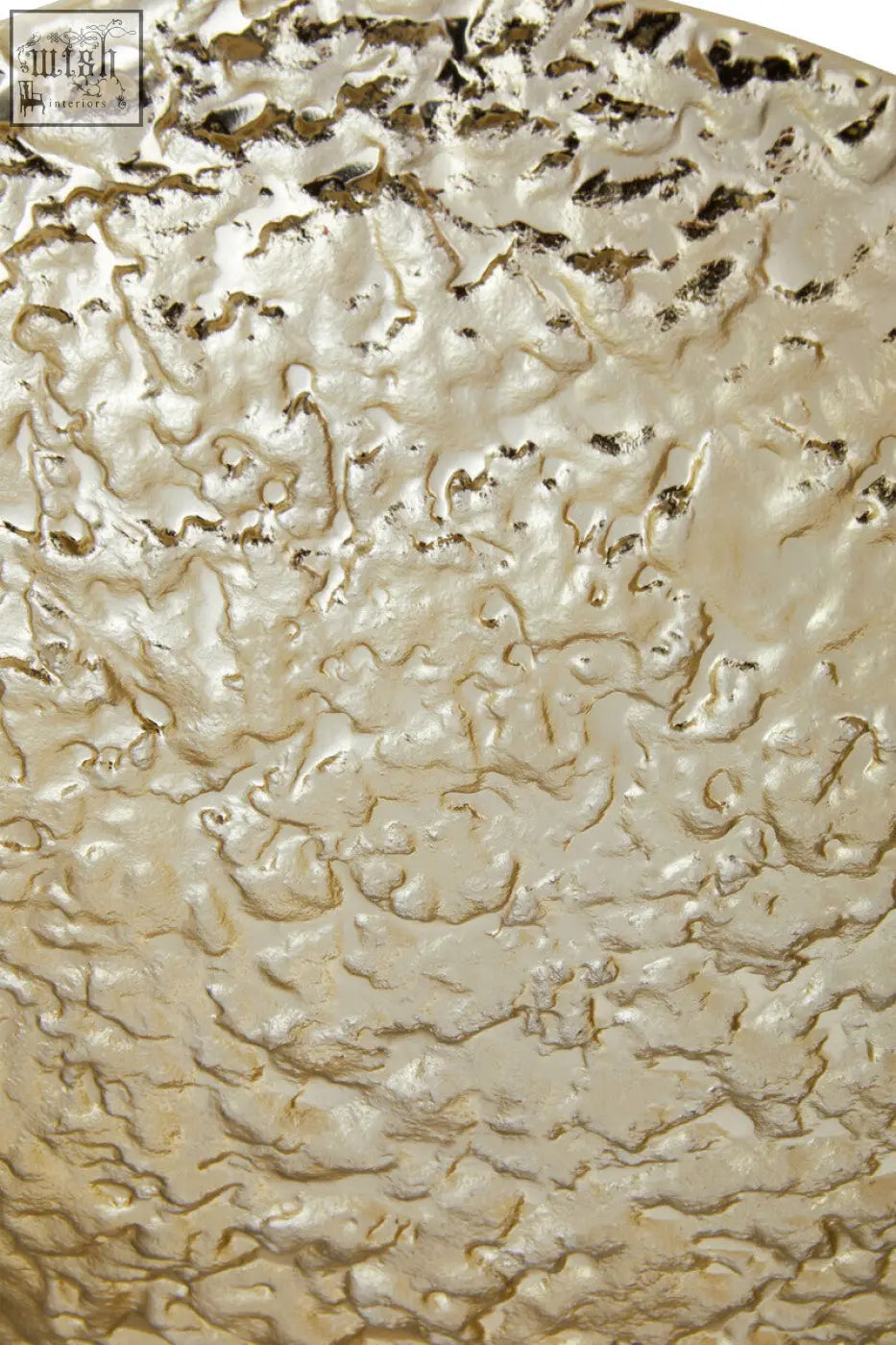 Akola gold textured round metal bowl with a hammered gold-toned metal surface and mottled finish