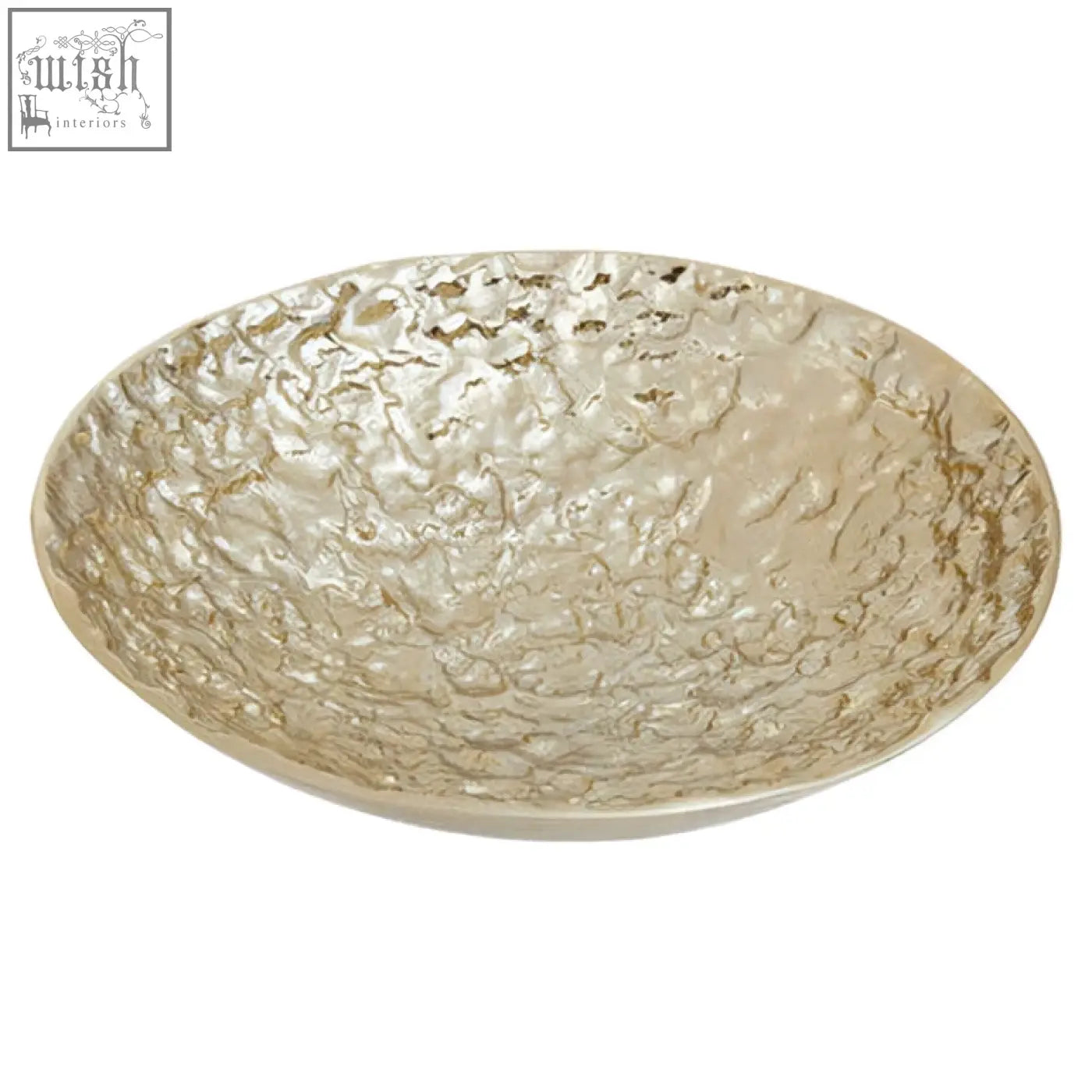 Gold textured round metal bowl made of hammered metal with a textured uneven surface and raised rim perfect for serving