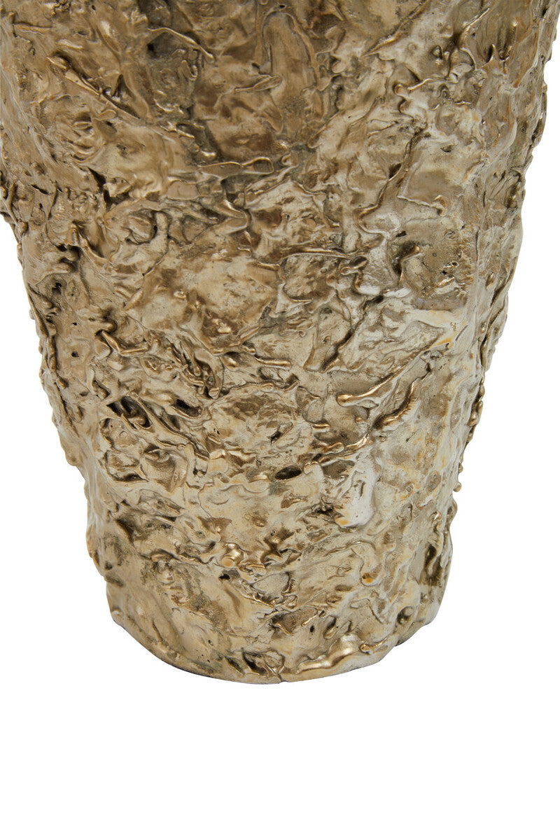A gold textured small metal vase with a rough sculpted surface resembling molten metal called akola gold textured