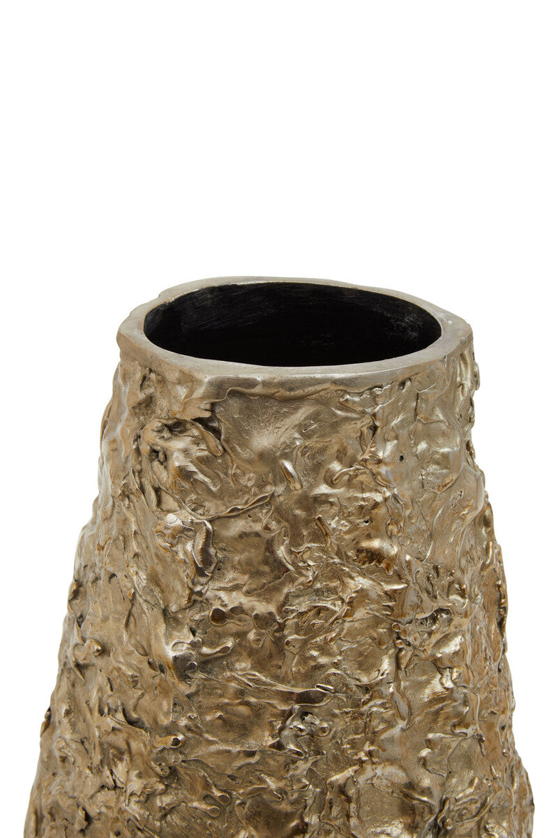 A gold textured small metal vase with a rough sculpted surface and open top perfect for decor accents