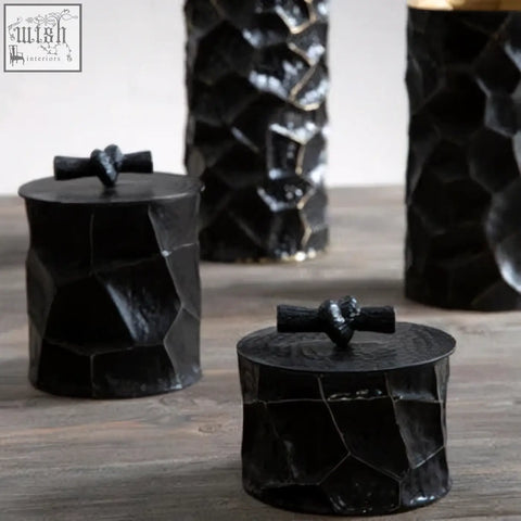 Large black textured ceramic trinket box with geometric faceting and dark wooden knobs for stylish storage