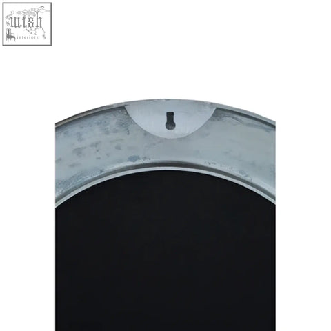 Akola nickle finish round wall mirror with galvanized metal frame and black reflective surface for stylish wall decor
