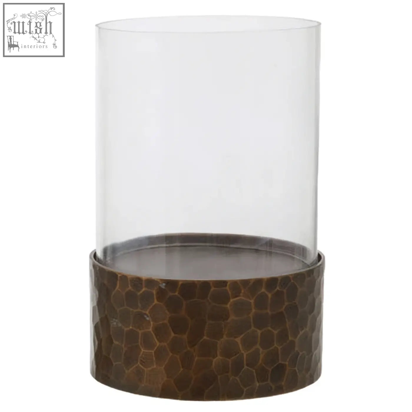 Clear glass cylinder candle holder with hammered bronze base in small antique gold finish for cozy lighting