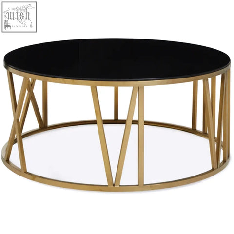 Alana round coffee table with a gold-toned geometric metal frame and sleek black glass top perfect for living rooms