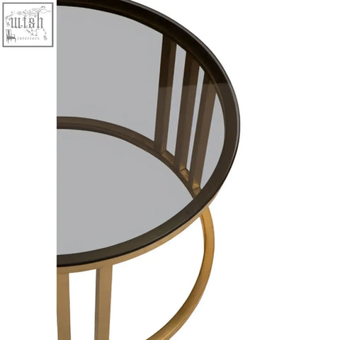 Gold-toned metal frame nesting coffee tables with circular glass top from alana set of 2 coffee tables