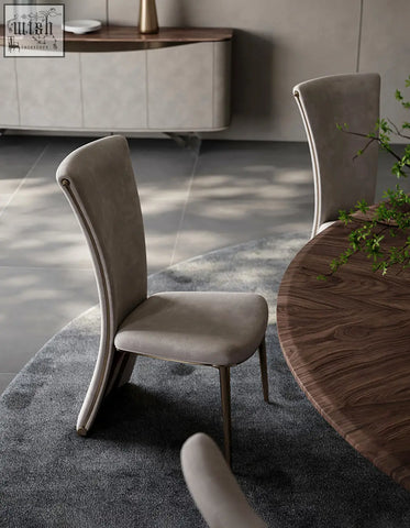 Beige albrecht high back dining chair with real leather upholstery and slender metal legs available with offer financing and low shipping cost