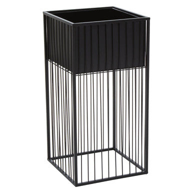Black metal alden floor standing planter with vertical slats and a solid top for stylish indoor plant display