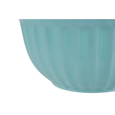 A teal ribbed ceramic bowl with glossy finish resembling alden melamine extra large green mixing bowl design