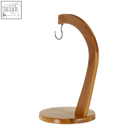 Aleiki bamboo banana hanger with a sleek curved wooden hook and sturdy circular base for hanging bananas