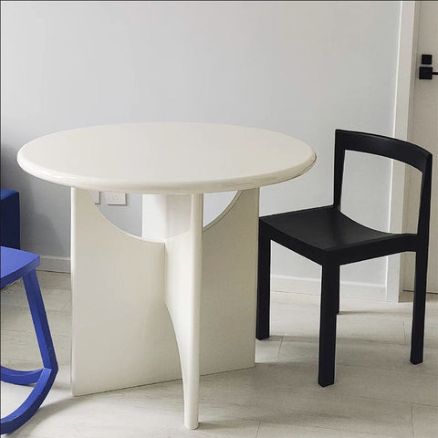 White round alen dining table with sleek modern design and curved legs perfect for stylish dining spaces