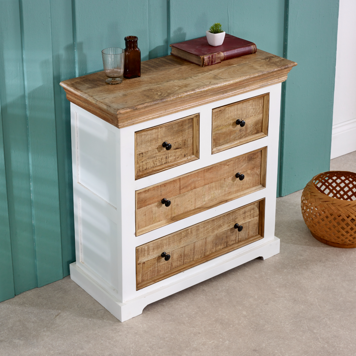 White and natural wood mango wood dresser with four drawers and black round knobs for stylish storage