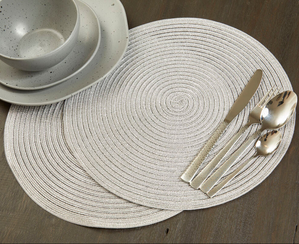 Circular textured gray placemat with concentric spiral patterns from alice round silver thread woven series