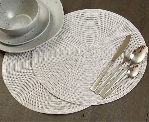 Circular textured gray placemat with concentric spiral patterns from alice round silver thread woven series