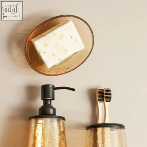 Allegra glass soap dish featuring a gold-toned textured glass toothbrush holder with black accents