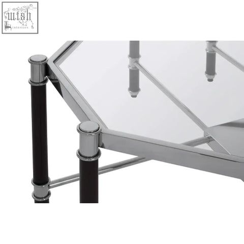 Allessi silver metal coffee table with black legs featuring a chrome hexagonal frame and clear glass top