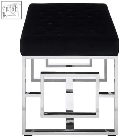 Allure black tufted bench featuring a black tufted velvet seat and geometric chrome metal frame stool design