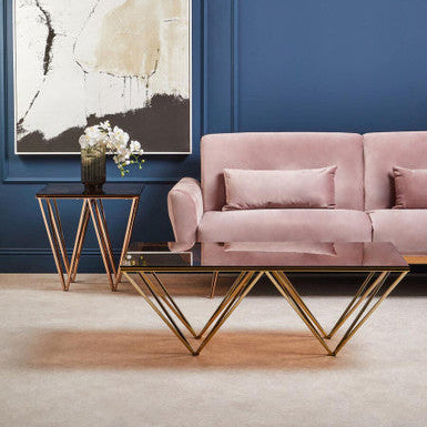 Modern geometric coffee table with glass top and allure champagne metal prismatic legs gold-tone frame