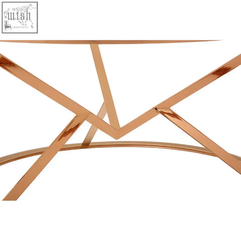 Allure corseted round rose gold coffee table with copper finish metal top and geometric angular base design