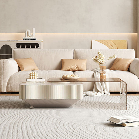 Cream-colored alonso coffee table with ribbed sintered stone base and sleek glass top for minimalist style