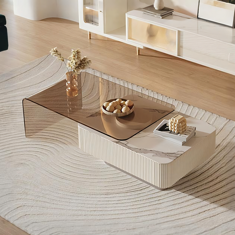 Modern alonso coffee table with transparent glass top and white sintered stone base with vertical ridges