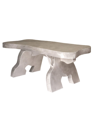 Silver-toned aluminium big table with rustic style, smooth uneven top, and sturdy sculptural legs
