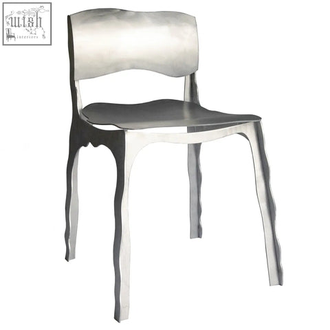 Silver metallic aluminium contemporary chair with sleek sculpted design and flowing legs for modern spaces