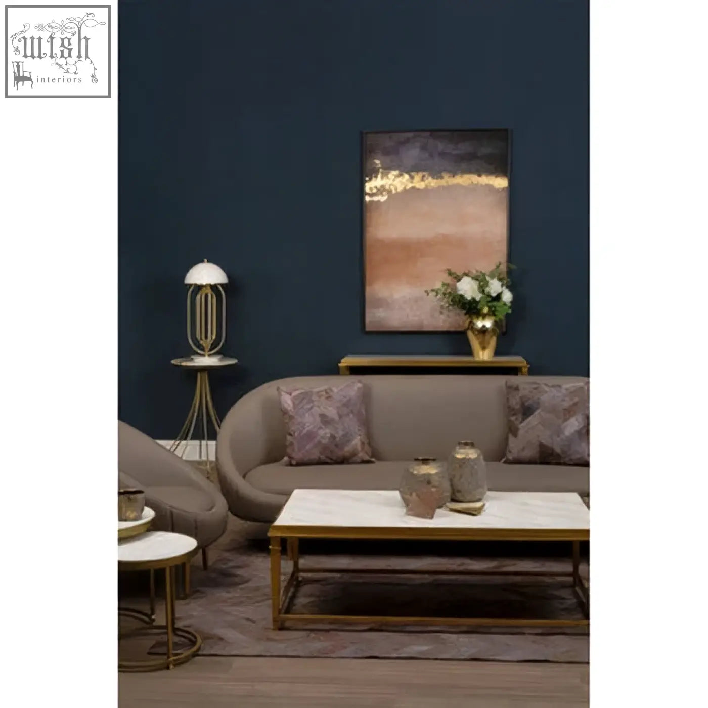 Alvaro rectangular coffee table with a sleek white marble top and thin gold metal legs for modern living rooms