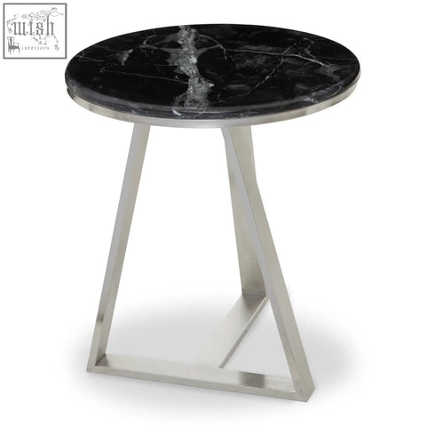 Alvaro round side table with black marble top and silver sledge base featuring sleek angular stainless steel legs