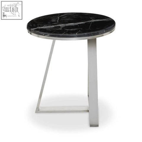 Alvaro round side table with black marble top and silver sledge base featuring sleek stainless steel legs