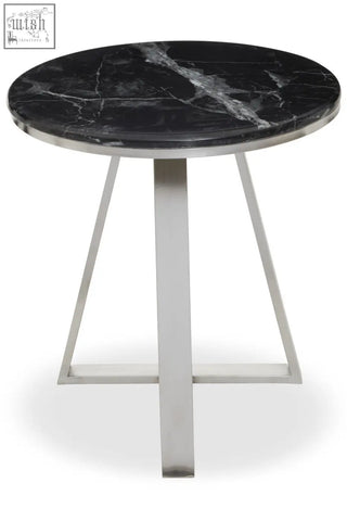 Alvaro round side table with black marble top and silver sledge base featuring polished stainless steel frame and angular legs