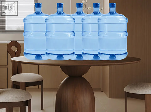 Five translucent blue water jugs on a wooden surface of amaia round pedestal dining table solid wood black