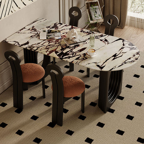 Marble patterned amaris dining table with black and white veining and dark metal legs for stylish dining spaces