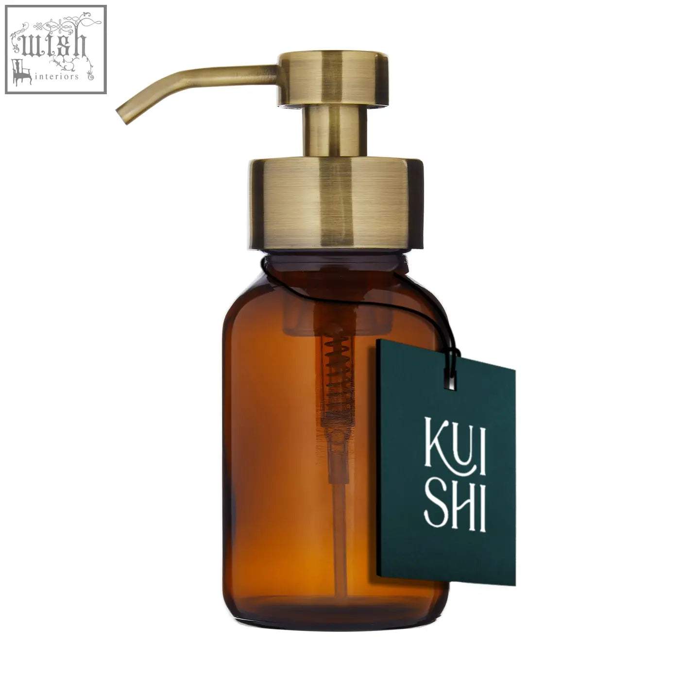 A sleek amber foaming hand soap dispenser with a brushed stainless steel pump and a dark green kui shi tag