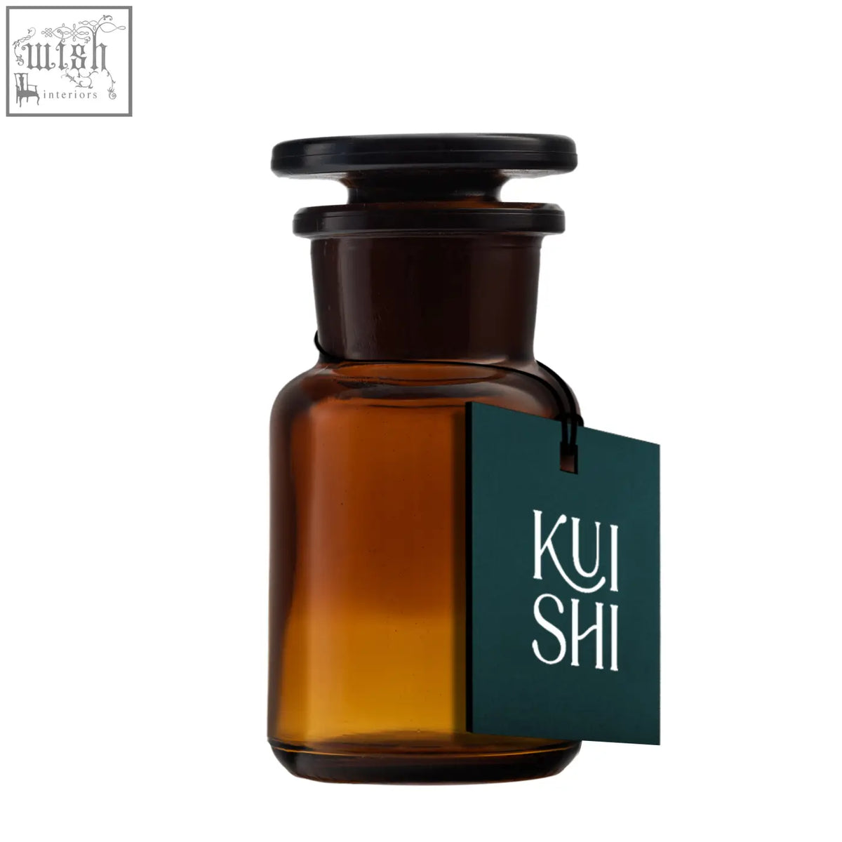 A dark amber glass apothecary jar with a black lid and teal kui shi tag perfect for stylish glass apothecary jars collections