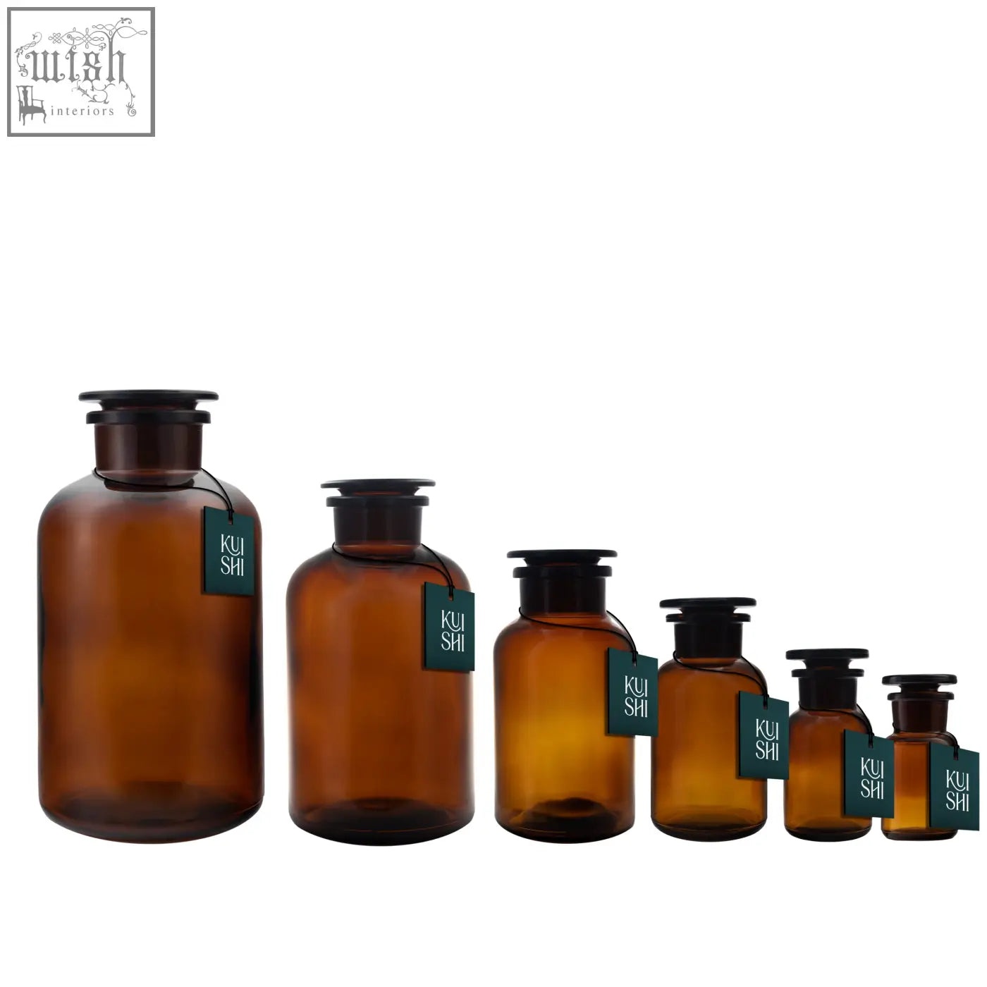 Set of six amber glass apothecary jars with black screw caps and green kui shi tags