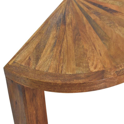 Rustic amber oak coffee table with half moon shape and sunburst pattern made from reclaimed wood in warm brown tones