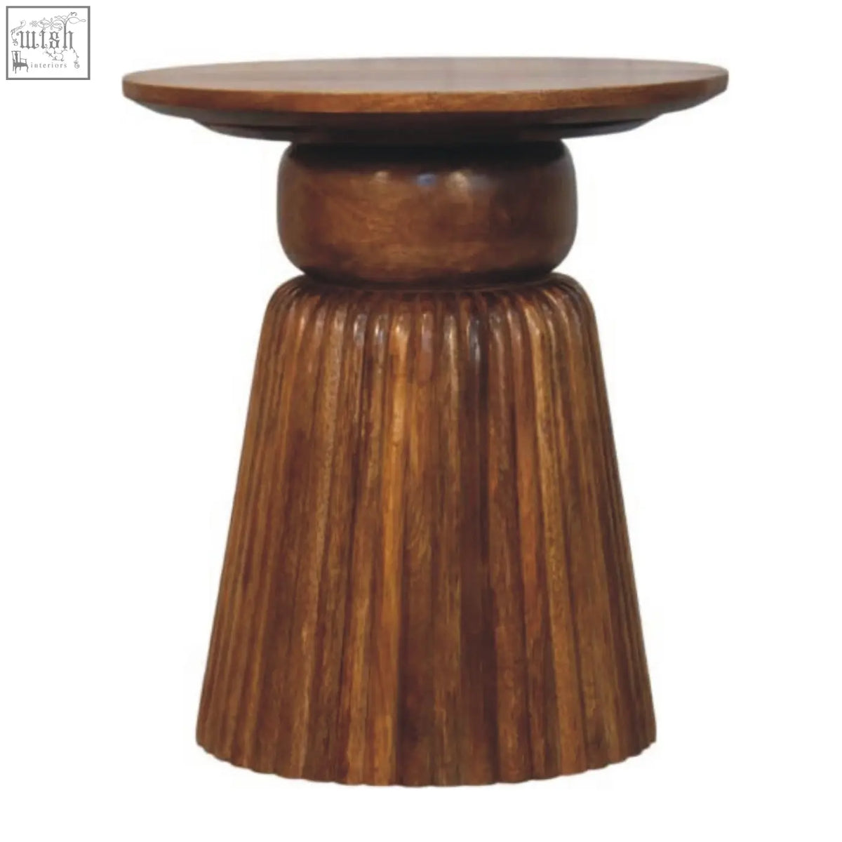 A rustic amber oak round side table with a smooth top and fluted tapered wooden base for cozy spaces