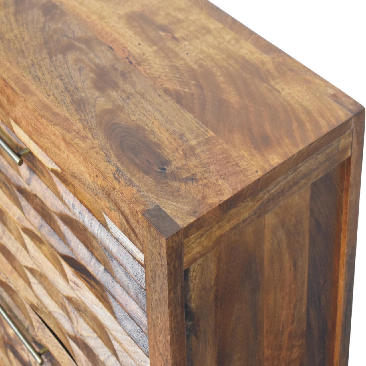 A rustic amber wavefront cabinet with warm natural wood finish and distinctive carved wooden paneling on the front