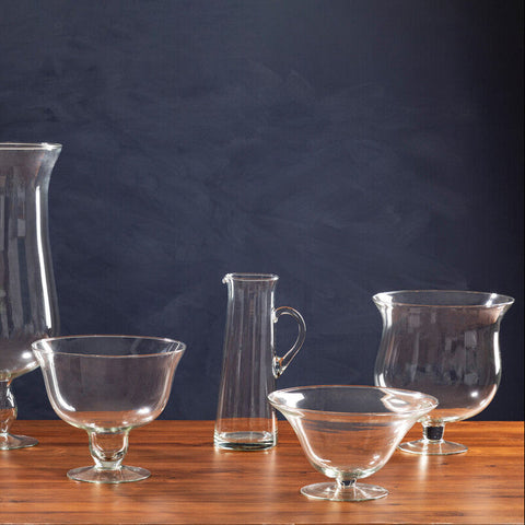 Ambra clear glass carafe and matching serving pieces with vintage-inspired designs and slender stems