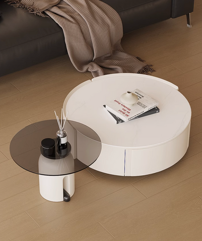 Modern white circular coffee table with minimalist design and vertical grooves in the amelia coffee table set