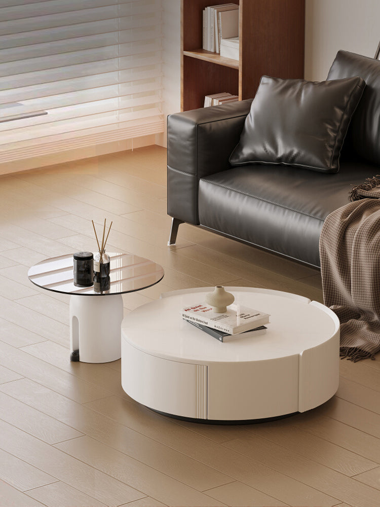 Modern white circular coffee table with sleek minimalist design and vertical grooves in amelia coffee table set