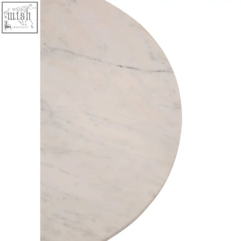 White marble half circle tabletop with subtle gray veining on amira marble gold base side table
