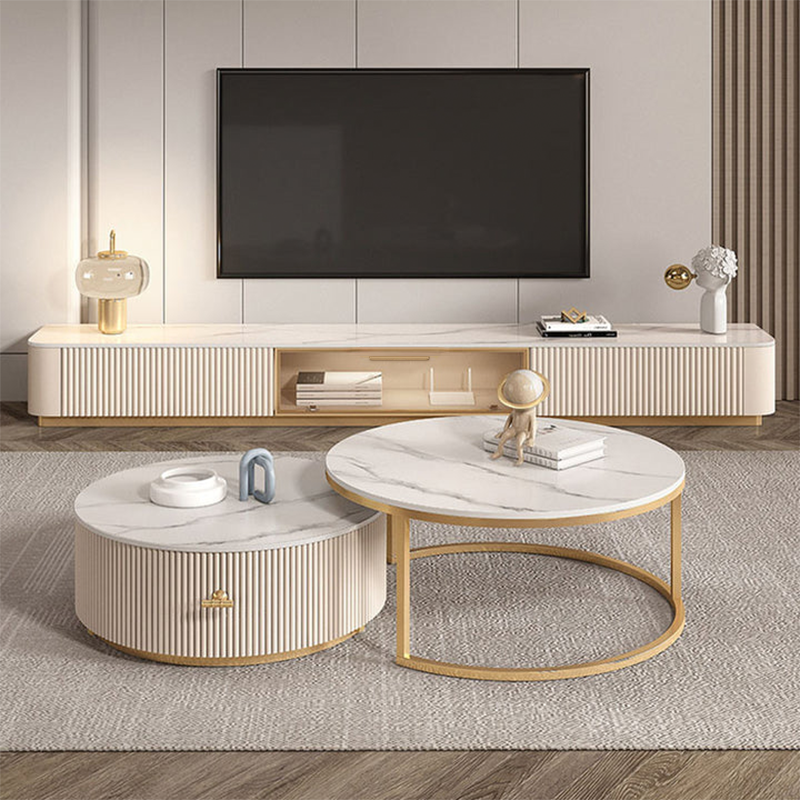 Modern round coffee table with white marble top and gold frame complementing anastasia tv stand sintered stone finish