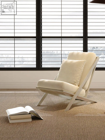 Cream-colored andrea white velvet armchair with minimalist wooden frame offer financing and low shipping cost available