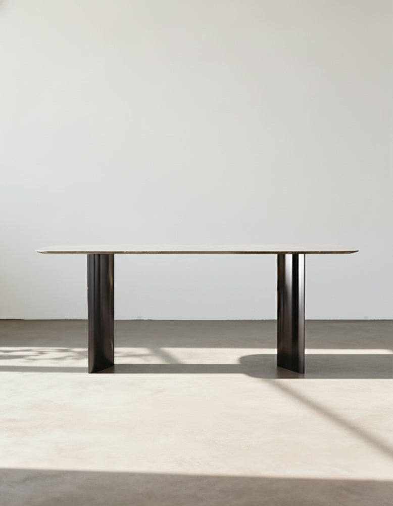 Angela dining table marble with sleek dark metal frame and glass top perfect for luxury dining and offer financing