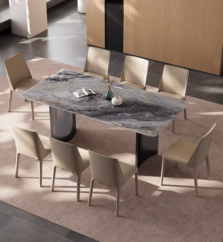 Modern rectangular dining table with gray marble top and dark metal legs surrounded by beige chairs perfect for luxury dining offer financing available